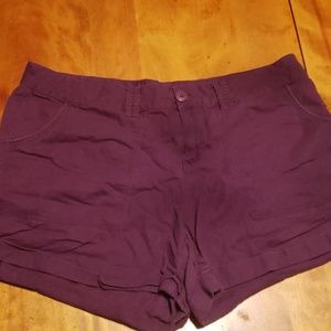 Maurice's purple shorts